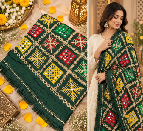 Beautiful embroidered Phulkari dupatta adorned with colourful traditional motifs and delicate mirror work.Slight variation in color and design is possible