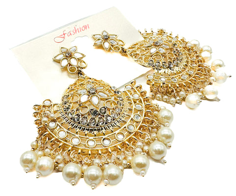 Golden stone with pearls work beautiful earrings