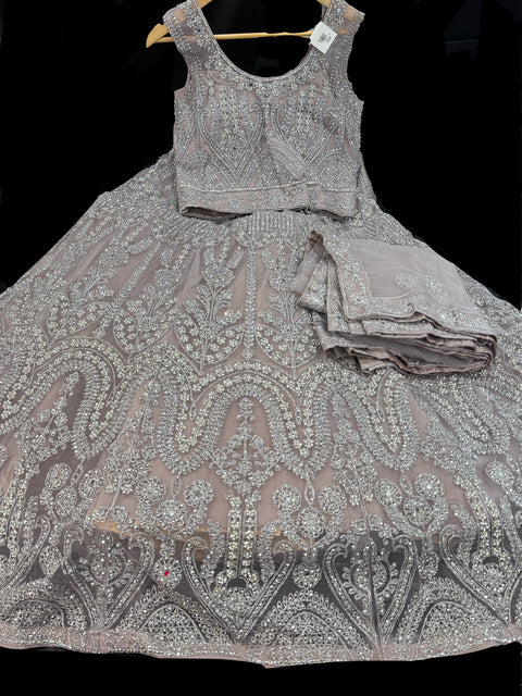 (Video clip attached)Heavy hand work designer stylish Blouse with very very heavy flared netting based  hand work princess style lehnga and dupatta