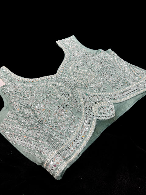 Stones and mirror work designer Blouse with netting shimmer work  design heavy flared lehnga and netting dupatta