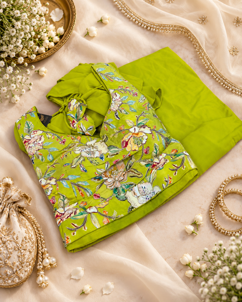 Elegant crepe Silk blouse featuring beautiful embroidery and sequin work, paired with a flowy georgette loose circular palazzo for a stylish Indo Western look. Slight variation in colour and design is possible.