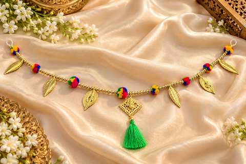 Festive Diwali Door Toran – Beautifully designed with colourful pom-poms, pearl detailing and elegant golden hanging accents. Slight variation in colour and design may occur