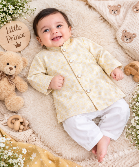 Adorable Brocade Silk Newborn Kurta Pajama Set with soft inner lining, easy front-open kurta and matching elasticated pajama for comfortable wear.Kurta L 35 cm,Chest 25 cm,Sleeve 24 cm,Pajama L 33 cm. Slight variation in colour & design may occur