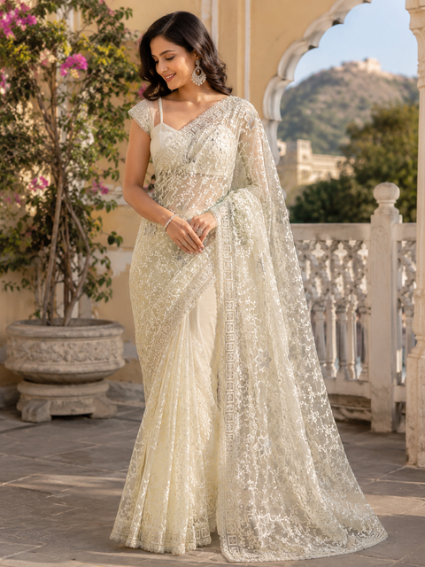 Netting based embroidery jaal all over with stone work designer saree(blouse piece worn by model is for reference only, blouse piece attached to Saree) slight variation in color and design is possible)