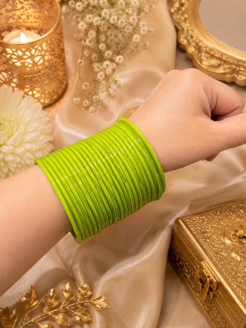 Neon Yellow Green plain glass bangles. Each set includes 2 dozen bangles. Price is per set. Slight colour variation may occur.