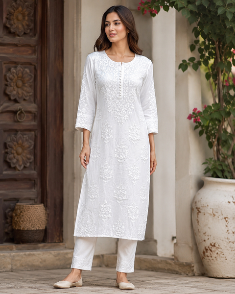 Very soft rayon-based kurti with elegant Lucknowi embroidery all over, giving it a graceful and timeless look. Pants are not included – this is kurti only. Slight variation in color and design is possible.