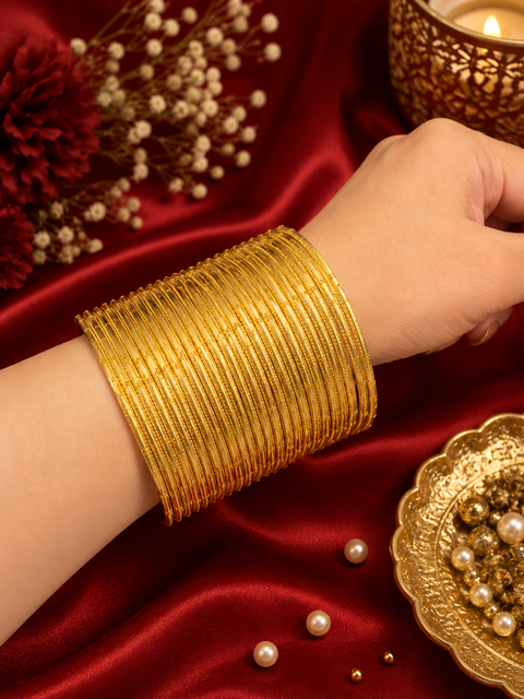 Golden Shimmer dotted metal bangles 2 dozen in 1 Set (slight variation in color & design may occur)