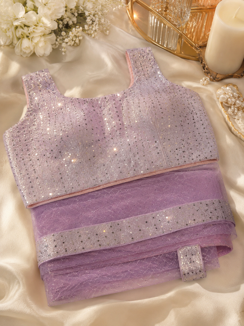 Shimmering saree featuring an all-over sparkle weave and dazzling sequin border, paired with a matching glitter blouse for an effortlessly glamorous party look(size 38-40 )slight variation in color and design is possible)