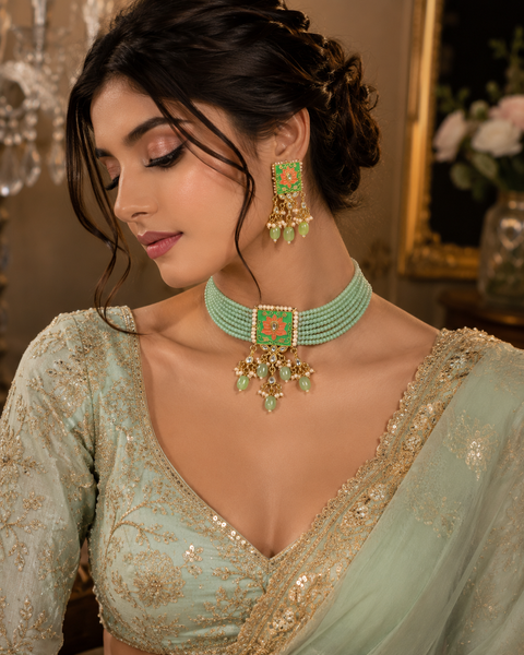 Pearls & meenkari work beautiful choker set with kundan stones(slight variation in color and design is possible)