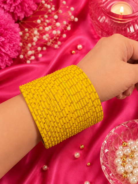 Golden Shimmer dotted metal bangles 2 dozen in 1 Set (slight variation in color & design may occur)