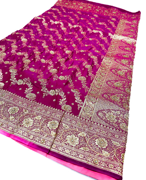Beautifully designed Banarasi Silk Saree with heavy Handwork with stones & Zari
