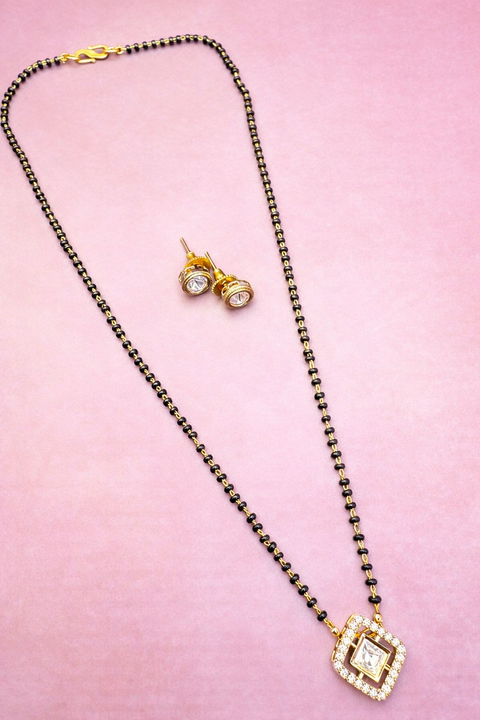 Golden Stone & Jerkan Gold Plated (Artificial) Mangalsutra With Artificial Black Beads Chain, and matching small studs Apx Size: 20-22cm
