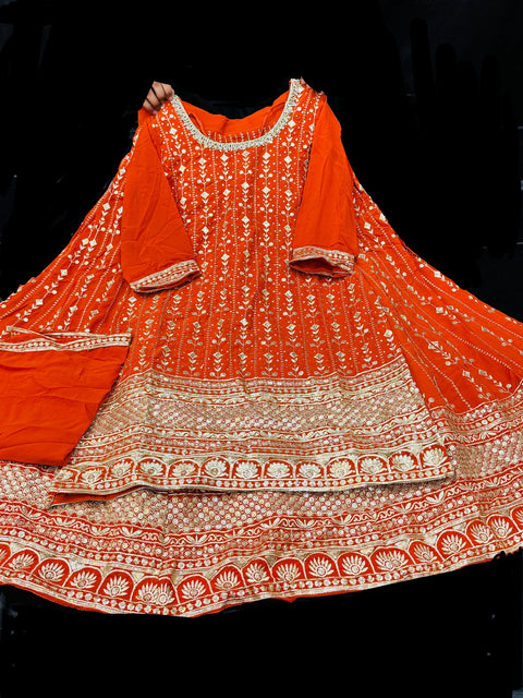 Georgette based All over embroidery with sequined work heavy design long kameez with heavy work multiflared lehnga and georgette dupatta