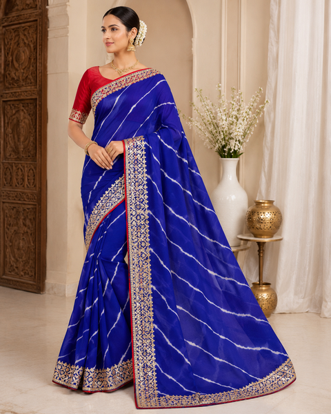 Soft georgette based lehariya print sarees with gotta patti and sequined work border. Blouse Worn By The Model Is For Reference Purposes Only. The Blouse Piece Is Attached Separately With The Saree. Slight Variation In Color And Design May occur