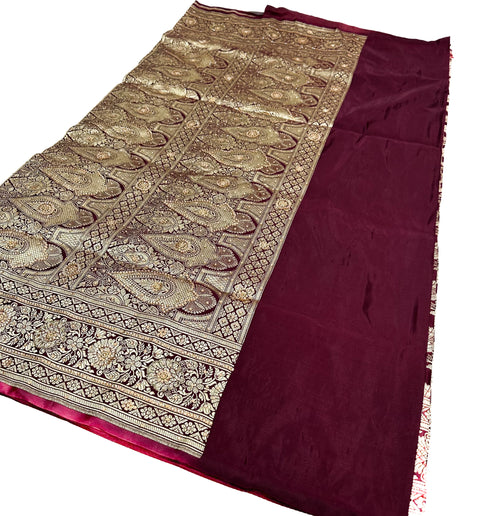 Beautifully designed Banarasi Silk Saree with heavy Handwork with stones & Zari