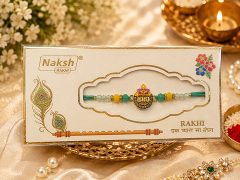 Elegant handcrafted Rakhi with premium beads and sparkling stonework, beautifully crafted to celebrate the special bond of love and protection.