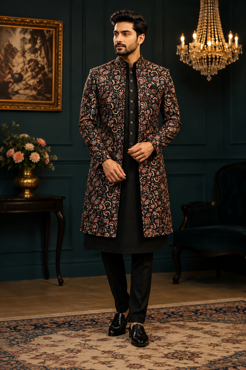 Elegant Floral Indo-Western Long Jacket Set featuring intricate woven floral detailing with a sleek black kurta and pants—perfect for weddings, receptions, sangeet, and festive celebrations. Slight variation in color and design may occur