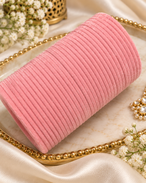 Elegant velvet bangles in a rich Dusty Rose Pink shade, perfect for festive, bridal and traditional looks. Each pack includes 3 dozen bangles (36 pieces). Price is per pack. Slight variation in colour may be possible
