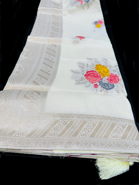 Cream color Pure and very soft brocade floral work silk saree