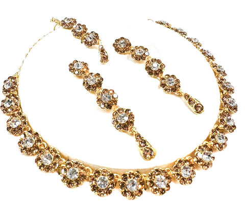Golden color Jerkan stone studded beautiful necklace set with Earrings & Tikka
