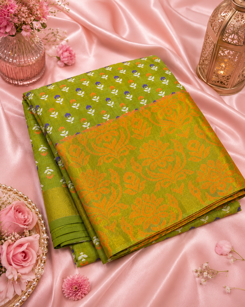 Graceful Semi Silk Cotton Saree adorned with charming floral prints and a rich woven pallu, An unstitched blouse piece is attached with the saree (slight variation in color and design is possible )