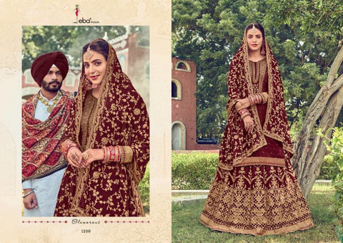 Wine colour opada silk kameez with heavy embroidery all over on kameez & dupatta and georgette based embroidery work lehnga
