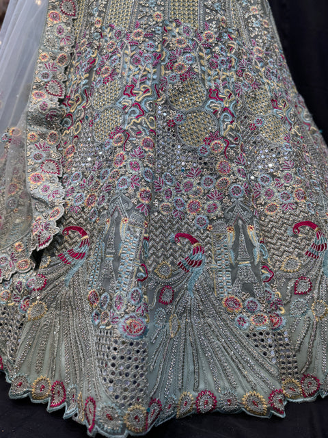 (Video clip attached ) Netting Based Beautiful Heavy Embroidered Peacock Design & Sequined With Stone Work Heavy Ken Ken Big Flare Stitched Lehnga & Blouse With Attached Tessels & Heavy Lace Border Beaded Work Dupatta