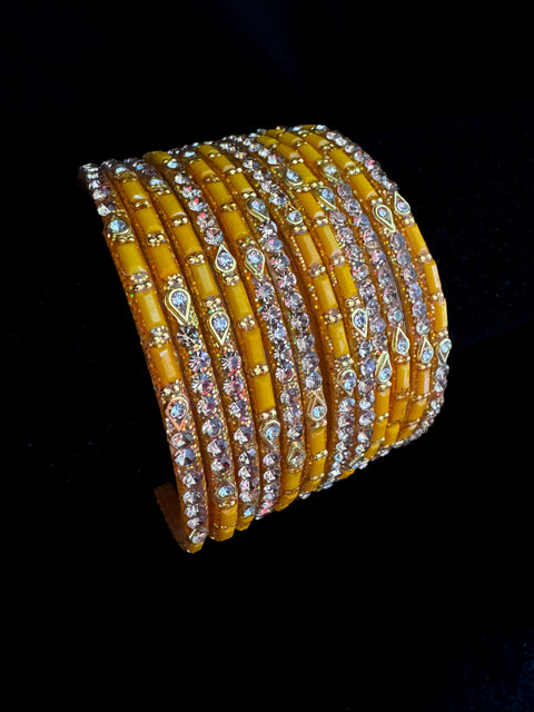 Haldi Yellow color Golden jerkan Stone beautiful Glass Bangles (1 Dozen in 1 pack ) Price per pack