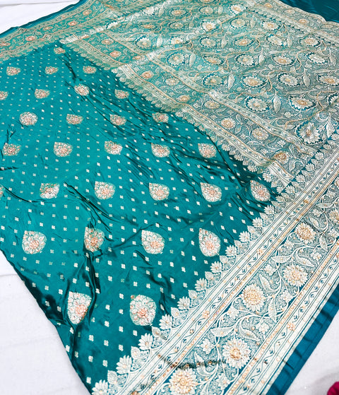Beautifully designed Banarasi Silk Saree with heavy Handwork with stones & Zari