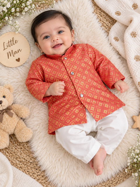 Adorable Brocade Silk Newborn Kurta Pajama Set with soft inner lining, easy front-open kurta and matching elasticated pajama for comfortable wear.Kurta L 35 cm,Chest 25 cm,Sleeve 24 cm,Pajama L 33 cm. Slight variation in colour & design may occur