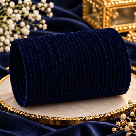 Elegant velvet bangles in a rich Dark Navy Blue shade, perfect for festive, bridal and traditional looks. Each pack includes 3 dozen bangles (36 pieces). Price is per pack. Slight variation in colour may be possible