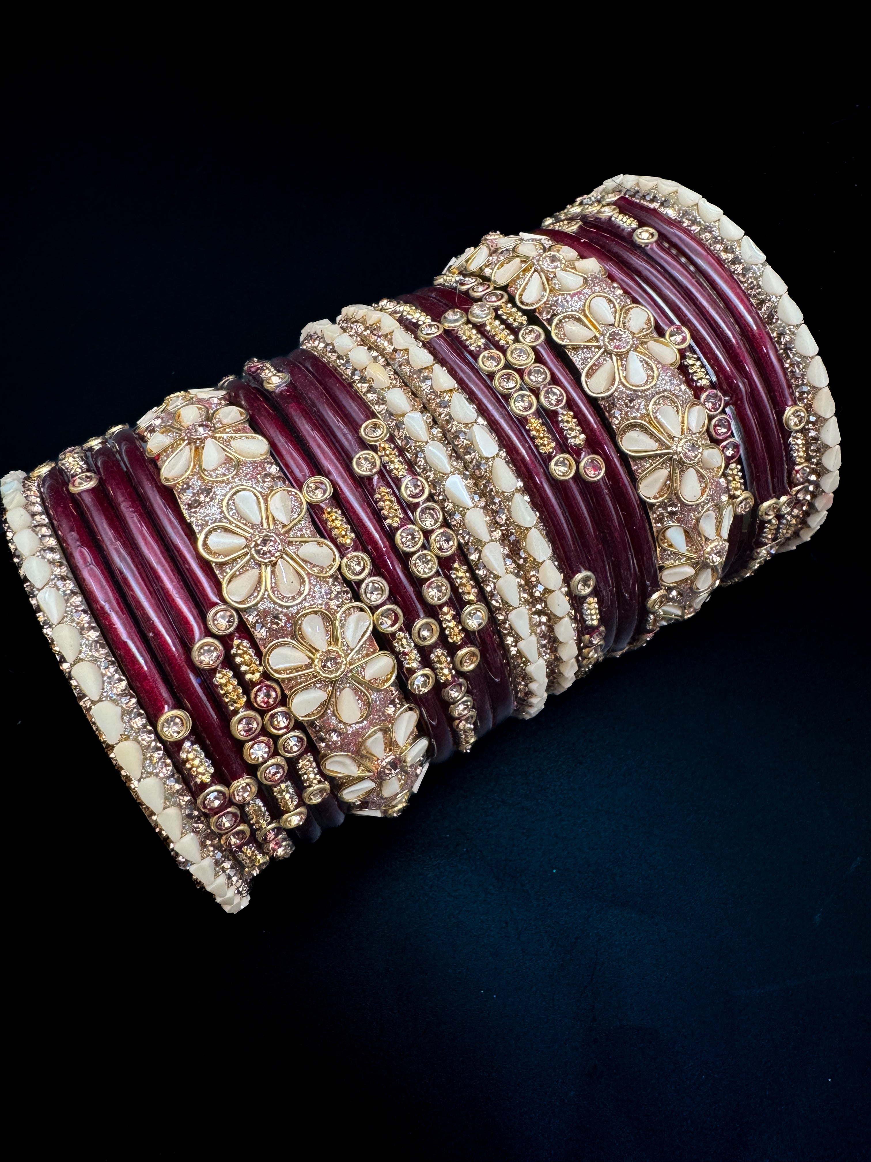 Maroon color Glass bangles with golden brass bangles set (displayed pi ...