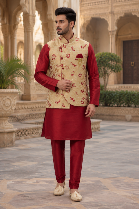Premium Maroon Kurta Set paired with a luxurious floral jacquard Nehru jacket, offering a timeless festive and wedding-ready look. Slight variation in color and design may occur.