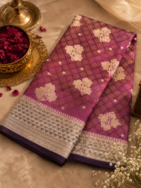 Premium two shaded Silk Saree with rich zari weaving and contrast woven pallu. featuring elegant dual-tone shades.Model-worn blouse is for reference only. Unstitched blouse piece is attached with saree(slight variation in color & design is possible)