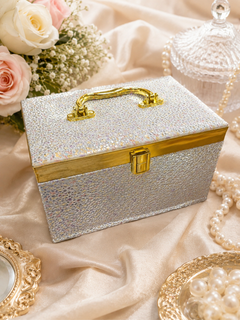 Elegant Pink & Silver Jewellery Box.Beautifully crafted with a sparkling silver exterior, luxurious gold detailing and soft pink velvet compartments—perfect for keeping your bangles and jewellery organised in style
Approx. Size: 25 × 17 × 14 cm