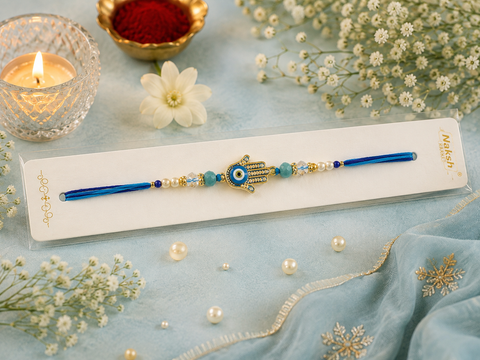 Evil eye Elegant handcrafted Rakhi with premium beads and sparkling stonework, beautifully crafted to celebrate the special bond of love and protection.