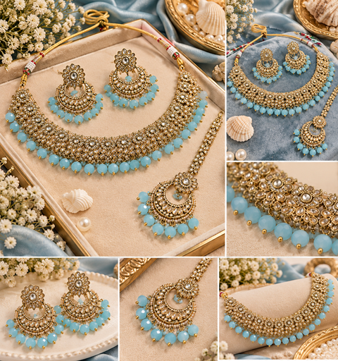 Beautiful polki stones with pearls and colorful stones necklace & earrings with Tikka. Slight variations in colour and design are possible