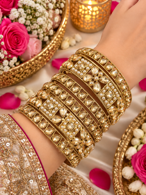 Beautiful bangle set featuring sparkling polki stones (Slight variations in color & design is possible )