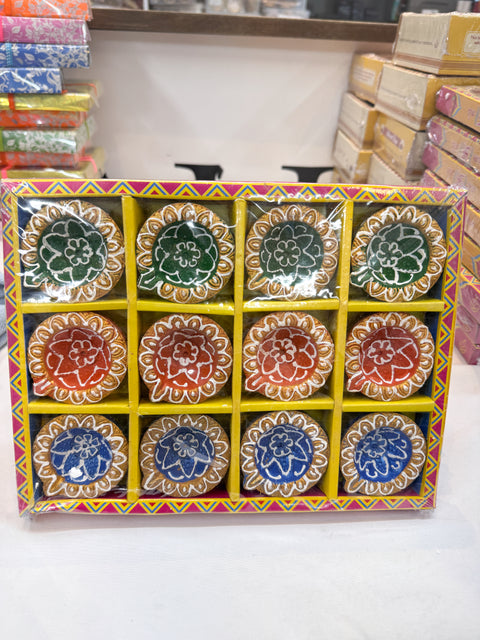 12 piece colour diya Natural Clay Traditional (Diwali Ke Diye) price per pack (slight variation in colors and design is possible )