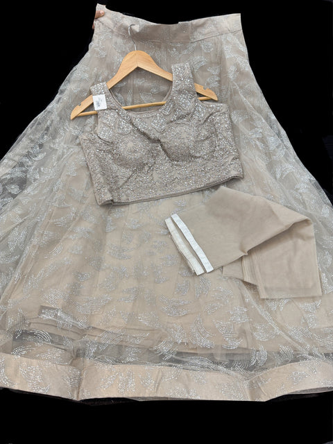 Stones and mirror work designer Blouse with netting shimmer work  design heavy flared lehnga and netting dupatta