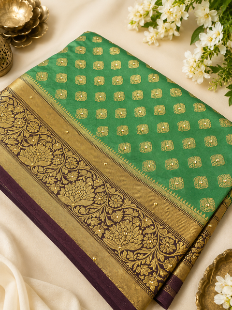 Premium Art Silk Saree Featuring Elegant Zari Weaving & Stone Work Throughout; Saree Comes With An Attached Blouse Piece. Model Blouse Is For Reference Only. Slight Variation In Colour And Design May Occur