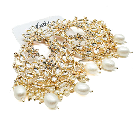 Golden stone with pearls work beautiful earrings