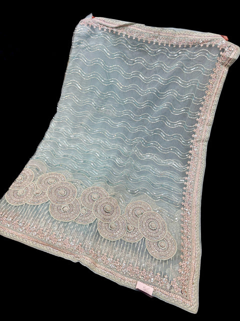 (Video Clip attached )Heavy work designer Saree with netting base fabric and stones work design all over with heavy embroidery work