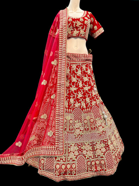 (Video clip attach)size 42(upto 46) fully stitched Red color full of embroidery and stones work blouse and all over heavy multi flared bridal wear lehnga with heavy work dupatta