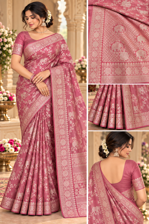 Luxuriously soft silk saree with a smooth, lightweight feel and beautifully flowy drape. Featuring rich woven zari floral motifs and an elegant detailed border .Blouse piece included. Slight variation in colour and design is possible.