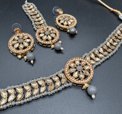 Beautiful pearls with stone beaded choker necklace with small studs and tikka