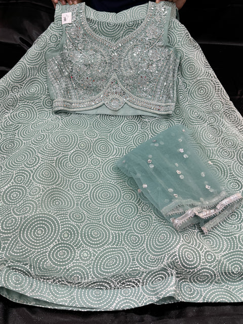 Stones and mirror work designer Blouse with netting shimmer work  design heavy flared lehnga and netting dupatta