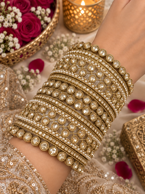 Beautiful bangle set featuring sparkling polki stones (Slight variations in color & design is possible )