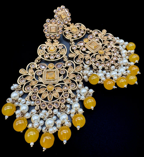 Original Polki with beautiful pearls heavy look Earrings with lite weight (slight variations in color and design is possible)