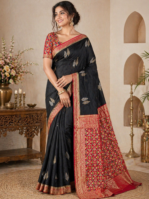 (Video clip attached)Black color saree with Red border & Pallu with beautiful patola design Very Very Soft Pure Dola Silk Beautiful Saree (very soft to set the pleates)